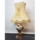 A decorative Italian table lamp and shade.
