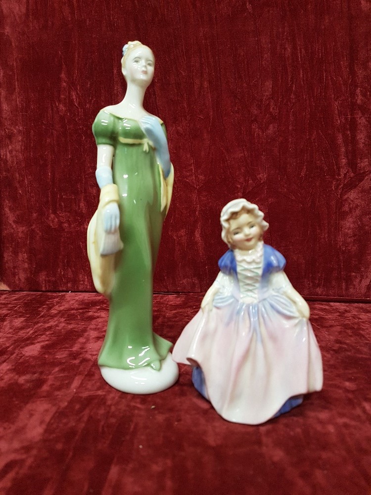 Two vintage Royal Doulton bone china figures.