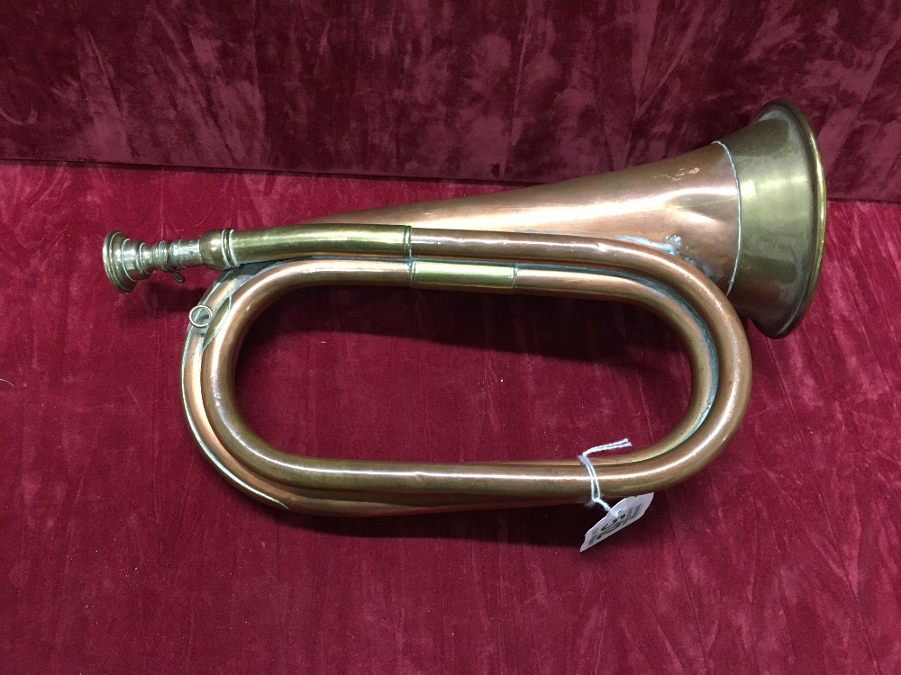 A Henry Potter & Co. brass bugle dated 1946.