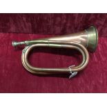 A Henry Potter & Co. brass bugle dated 1946.
