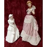 A Wedgwood porcelain figurine 1988 ‘Enchanted Evening’ and small Coalport figurine.