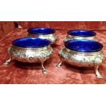 A set of four silver salts.