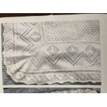 A beautiful hand knitted cot/ moses-basket or christening blanket.
