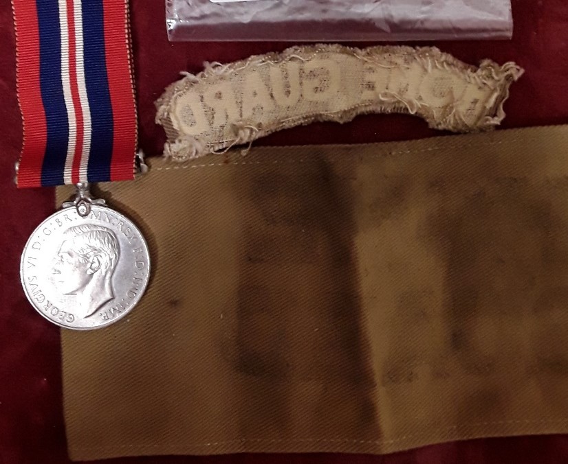 An original WW2 printed Home Guard armband and shoulder flash together with a Defence Medal - Image 3 of 3