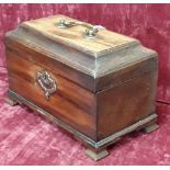 A small mahogany tea caddy.