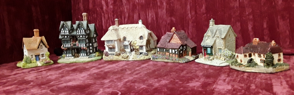 A collection of six Lilliput Lane buildings including two early and two signed.