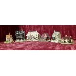A collection of six Lilliput Lane buildings including two early and two signed.