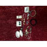 A collection of costume jewellery in three boxes including silver.