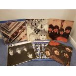 A collection of original Beatles albums produced in the 1960’s.