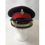 A British Army ETS major's cap with gold bullion wire to visor together with badge.