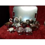 Collection of Art Deco style stainless steel tea service items some with bakelite/ceramic fittings.