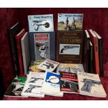 A collection of books for gun enthusiasts.