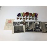 A WW2 Royal Navy medal group, ID tags and period photographs.