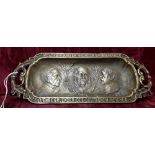 A heavy cast brass dish showing the founders of the German Empire.