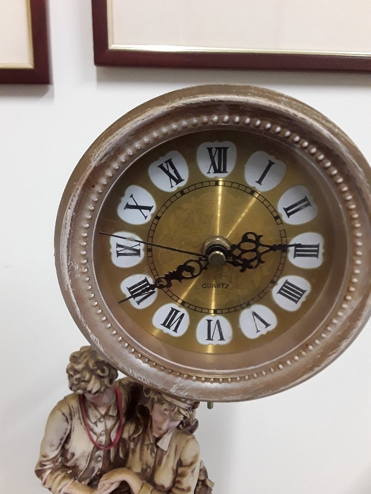 A Contemporary Academy Collection figurine sculpture of couple sitting beneath a clock. - Image 3 of 3