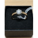 A 9ct yellow gold solitaire ring set with large CZ and inscribed I Love You on the inside.