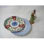 A selection of porcelain plates and The Country Market Collection Gipsy Girl by Wedgwood.