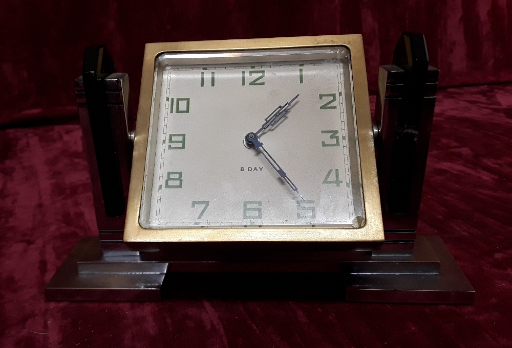 A small Art Deco style mantel clock with 8 day movement.