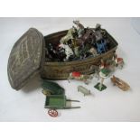 A collection of lead farm animals, farm equipment and ceremonial horses. Including Britains.