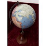 An attractive desk globe on wooden plinth. Height 57cm.