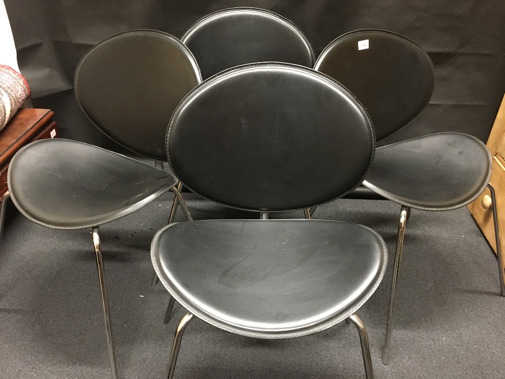 A set of four Italian designer chairs by Arrmet.