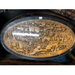 A large and unusual oval table wiht six seats beneath. Made in Hong Kong.