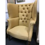 A George III wing back chair. Re-upholstered.