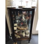 A glass fronted mahogany display cabinet.