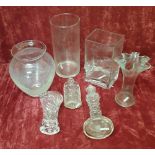 A collection of seven pieces of glassware to include vases and perfume bottles (one Lancome).