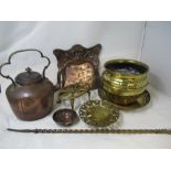 An assortment of copper and brass ware