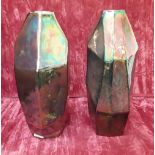 Two iridescent glass vases of angular form.