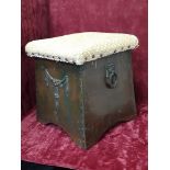 A 19th Century wood lined copper French box with upholstered seat.