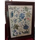 A large oak framed firescreen with hand embroidered commemorative tapestry under glass.