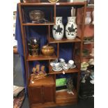 A large Chinese display cabinet with six shelves, a cupboard and drawer.