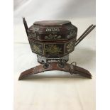 A late 19th Century/ early 20th Century Chinese wooden rice pot with painted decoration.