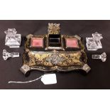 A Victorian mother of pearl and gilt desk tidy.