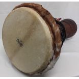 A large djembe drum by Kambala with padded carry case.