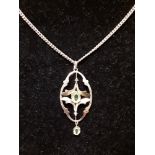 A 9ct yellow gold necklace with 9ct yellow gold Art Nouveau pendant set with two small amethysts.