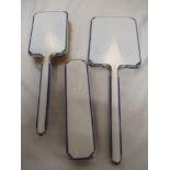 An Adie Bros. Ltd silver vanity set hallmarked Birmingham 1937, backed with white and blue enamel