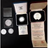 A collection of silver coins including a George IV 1819 crown.