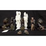 A collection of small Chinese soapstone figurines.