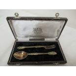 A silver plated Christening spoon and fork, boxed.
