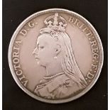 An 1889 Queen Victoria silver crown.