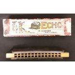 A 1930s harmonica by Echo with its original box.