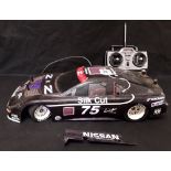 A mid 1990's Nascar remote control car.