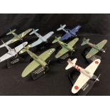 A set of eight model planes including the F4U Corsair, the Thunderbolt, the Hellcat, etc.