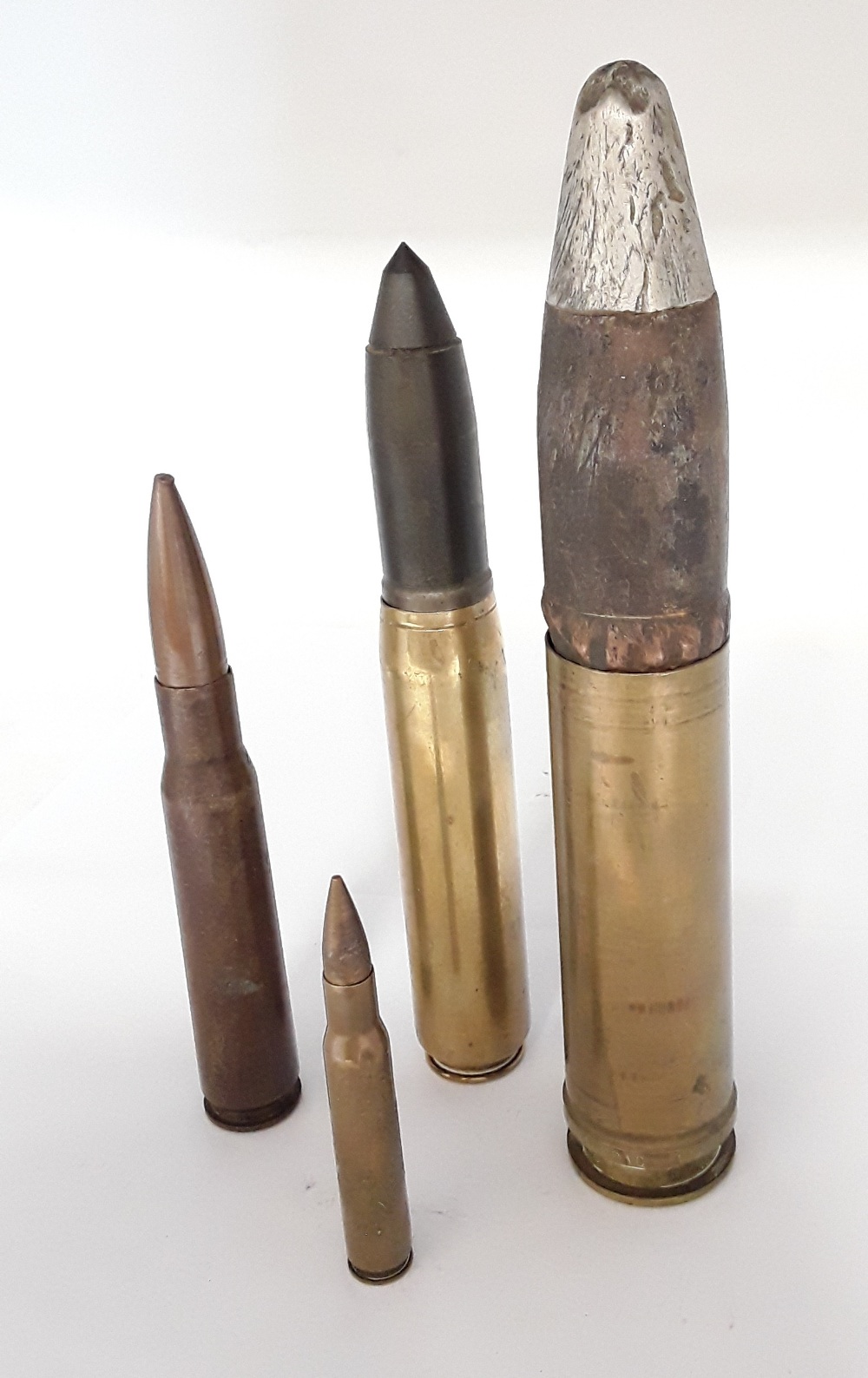 Two inert cannon rounds together with two inert bullets. - Image 2 of 3