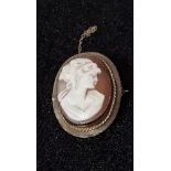 A cameo brooch set in 9ct gold.