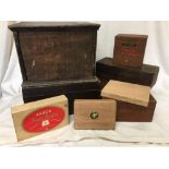 A collection of wooden boxes including money boxes.