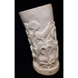 A heavily carved ivory vase/tall brush pot.